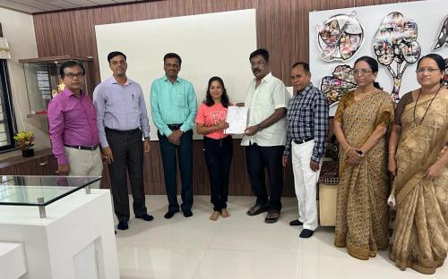 Dr.Yogesh  KShirsagar felicitates PG Student (Home Science) ku. Anjali Darade  for securing Topper in Dr. B.A.M.U.