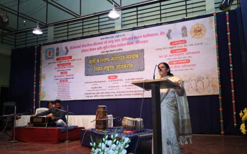 6.	Dr. Anita Shinde introducing Artist  at Cultural Program to the audience of Tow Day’s National Conference on the topic of Icons, Sculpture, Temple and Architecture. Organized by Department of History dated 10th February 2023.